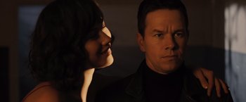 Movie still from “Max Payne” (2008), directed by John Moore – A man and a woman looking at one another; Close Up shot, Over the shoulder angle