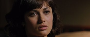 Movie still from “Max Payne” (2008), directed by John Moore – A woman's face with brown eyes; Close Up shot, Over the shoulder angle