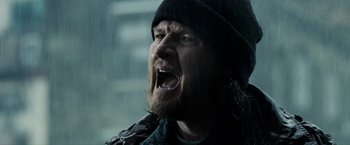 Movie still from “Max Payne” (2008), directed by John Moore – A person with a beard; Close Up shot, Low angle