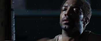 Movie still from “Max Payne” (2008), directed by John Moore – A person with sweat on his face; Close Up shot, Low angle