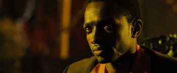 Movie still from “Max Payne” (2008), directed by John Moore – A person wearing a jacket; Close Up shot, Low angle