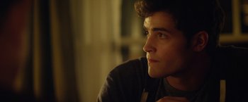 Movie still from “Max Steel” (2016), directed by Stewart Hendler – A person sitting in front of a window; Close Up shot, Over the shoulder angle