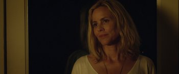 Movie still from “Max Steel” (2016), directed by Stewart Hendler – A woman with blonde hair is looking at the camera; Close Up shot, Over the shoulder angle