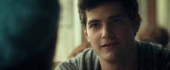 Movie still from “Max Steel” (2016), directed by Stewart Hendler – A young man's face; Close Up shot, Over the shoulder angle