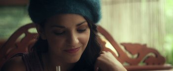 Movie still from “Max Steel” (2016), directed by Stewart Hendler – A person wearing a blue hat; Close Up shot, Over the shoulder angle