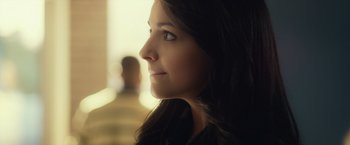 Movie still from “Max Steel” (2016), directed by Stewart Hendler – A woman's face in a room; Close Up shot, Over the shoulder angle