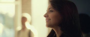 Movie still from “Max Steel” (2016), directed by Stewart Hendler – A woman's smiling face; Close Up shot, Low angle