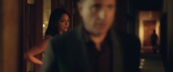 Movie still from “Max Steel” (2016), directed by Stewart Hendler – A man and a woman are standing in front of a window; Close Up shot, Over the shoulder angle