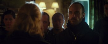 Movie still from “Max Steel” (2016), directed by Stewart Hendler – A group of people standing in front of a mirror; Close Up shot, Over the shoulder angle