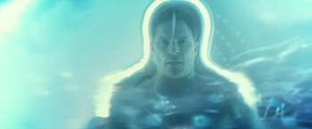 Movie still from “Max Steel” (2016), directed by Stewart Hendler – A man in a body of water with a halo around his head; Close Up shot, Overhead angle