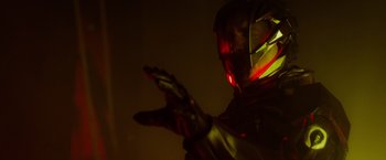 Movie still from “Max Steel” (2016), directed by Stewart Hendler – A person wearing a helmet and gloves; Close Up shot, Low angle