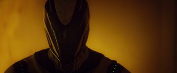 Movie still from “Max Steel” (2016), directed by Stewart Hendler – A person wearing a helmet; Close Up shot, Low angle