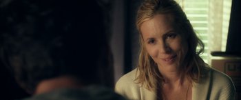 Movie still from “Max Steel” (2016), directed by Stewart Hendler – A person sitting in front of a window; Close Up shot, Over the shoulder angle