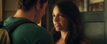 Movie still from “Max Steel” (2016), directed by Stewart Hendler – A man and a woman looking at one another in a room; Close Up shot, Over the shoulder angle