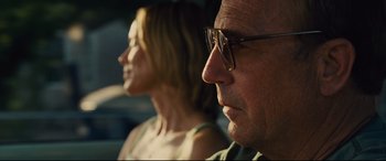 Movie still from “McFarland, USA” (2015), directed by Niki Caro – A man and a woman wearing glasses looking at each other; Close Up shot, Low angle