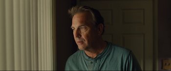 Movie still from “McFarland, USA” (2015), directed by Niki Caro – A person wearing a shirt; Close Up shot, Low angle