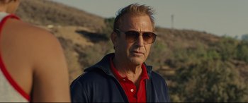 Movie still from “McFarland, USA” (2015), directed by Niki Caro – A person with sunglasses on; Close Up shot, Low angle