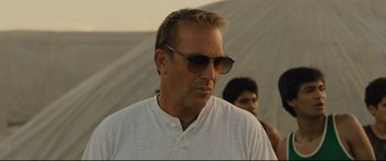 Movie still from “McFarland, USA” (2015), directed by Niki Caro – A person wearing sunglasses; Close Up shot, Over the shoulder angle