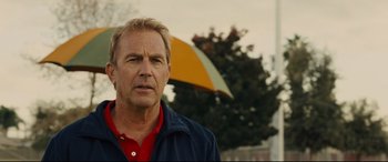 Movie still from “McFarland, USA” (2015), directed by Niki Caro – A person with an umbrella; Close Up shot, Low angle