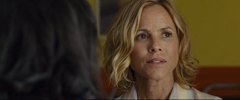 Movie still from “McFarland, USA” (2015), directed by Niki Caro – A person with blonde hair; Close Up shot, Over the shoulder angle