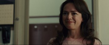 Movie still from “McFarland, USA” (2015), directed by Niki Caro – A person with long brown hair; Close Up shot, Over the shoulder angle