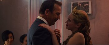 Movie still from “McFarland, USA” (2015), directed by Niki Caro – A man and a woman are dancing in a room; Close Up shot, Over the shoulder angle