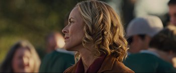 Movie still from “McFarland, USA” (2015), directed by Niki Caro – A person with long blonde hair; Close Up shot, Over the shoulder angle