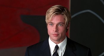Movie still from “Meet Joe Black” (1998), directed by Martin Brest – A person wearing a suit and tie; Close Up shot, Over the shoulder angle