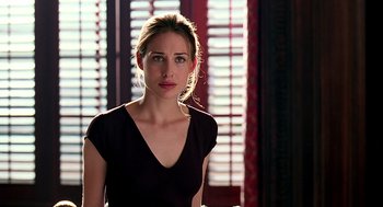 Movie still from “Meet Joe Black” (1998), directed by Martin Brest – A beautiful young lady wearing a black shirt; Close Up shot, Over the shoulder angle