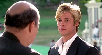 Movie still from “Meet Joe Black” (1998), directed by Martin Brest – A man with blonde hair and blue eyes talking to another man in a suit; Close Up shot, Over the shoulder angle