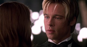Movie still from “Meet Joe Black” (1998), directed by Martin Brest – A person wearing a suit and tie; Close Up shot, Over the shoulder angle