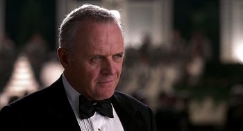 Movie still from “Meet Joe Black” (1998), directed by Martin Brest – An older man wearing a tuxedo and a bow tie; Close Up shot, Low angle