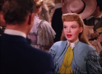 Movie still from “Meet Me in St. Louis” (1944), directed by Vincente Minnelli – A man and a woman are talking to each other; Close Up shot, Over the shoulder angle