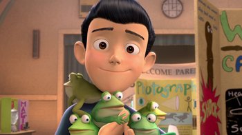 Movie still from “Meet the Robinsons” (2007), directed by Stephen J. Anderson – A man is holding a bunch of green frogs; Close Up shot, High angle