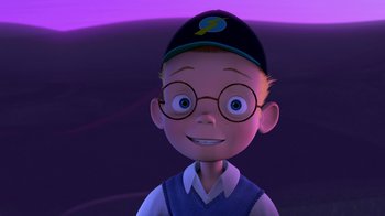 Movie still from “Meet the Robinsons” (2007), directed by Stephen J. Anderson – A cartoon boy wearing glasses and a hat; Medium shot, High angle