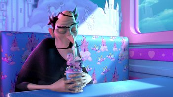 Movie still from “Meet the Robinsons” (2007), directed by Stephen J. Anderson – A man sitting at a table with a cup in his mouth; Medium shot, Over the shoulder angle