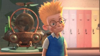 Movie still from “Meet the Robinsons” (2007), directed by Stephen J. Anderson – A boy with spiky yellow hair and glasses is standing in front of an airplane; Medium shot, Over the shoulder angle