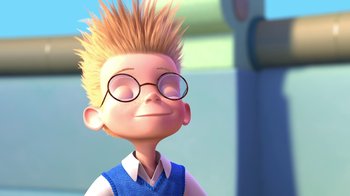 Movie still from “Meet the Robinsons” (2007), directed by Stephen J. Anderson – A cartoon boy wearing glasses and a blue shirt; Close Up shot, Low angle
