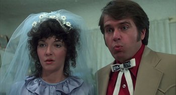 Movie still from “Melvin and Howard” (1980), directed by Jonathan Demme – A man and a woman dressed as a bride and groom; Close Up shot, Low angle