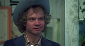 Movie still from “Melvin and Howard” (1980), directed by Jonathan Demme – A person wearing a cowboy hat; Close Up shot, Over the shoulder angle