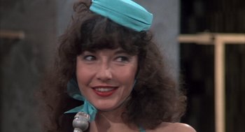 Movie still from “Melvin and Howard” (1980), directed by Jonathan Demme – A person with a microphone; Close Up shot, Over the shoulder angle
