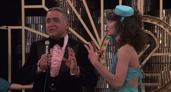 Movie still from “Melvin and Howard” (1980), directed by Jonathan Demme – A man and a woman are talking to each other; Medium shot, Over the shoulder angle