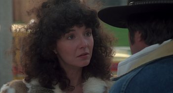 Movie still from “Melvin and Howard” (1980), directed by Jonathan Demme – A person wearing a hat; Close Up shot, Over the shoulder angle