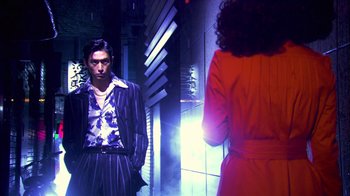 A man and a woman standing next to each other