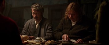 Movie still from “Men & Chicken” (2015), directed by Anders Thomas Jensen – A man and a woman sitting at a dinner table; Medium shot, Over the shoulder angle