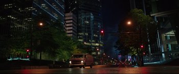 Movie still from “Metallica Through the Never” (2013), directed by Nimród Antal – A van driving down a street at night; Extreme Wide shot, Low angle