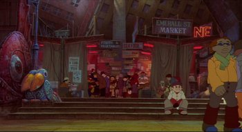 Movie still from “Metropolis” (2001), directed by Rintarô – An image of an animated scene of a market place; Wide shot, High angle