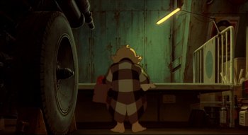 Movie still from “Metropolis” (2001), directed by Rintarô – A person standing in front of a wall; Wide shot, High angle