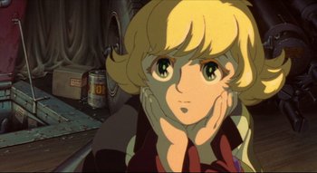 Movie still from “Metropolis” (2001), directed by Rintarô – A cartoon character with her hands on her face; Close Up shot, High angle