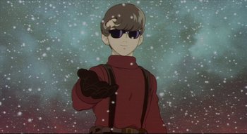 Movie still from “Metropolis” (2001), directed by Rintarô – A man in a red shirt and black suspenders; Medium shot, Low angle